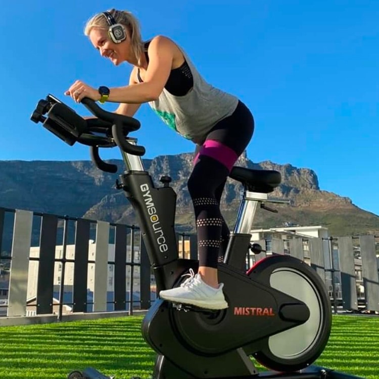 Silent indoor cycling with wireless headphones
